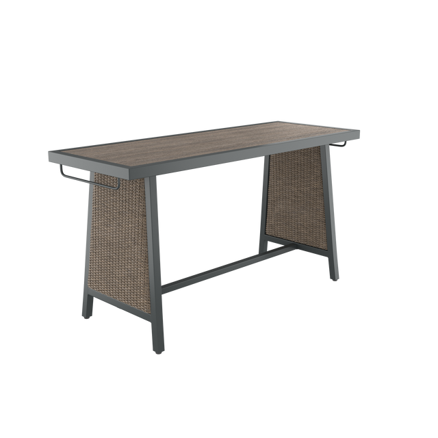 Angled brown dining table with wood effect top, wicker side, towel rack, and footrest
